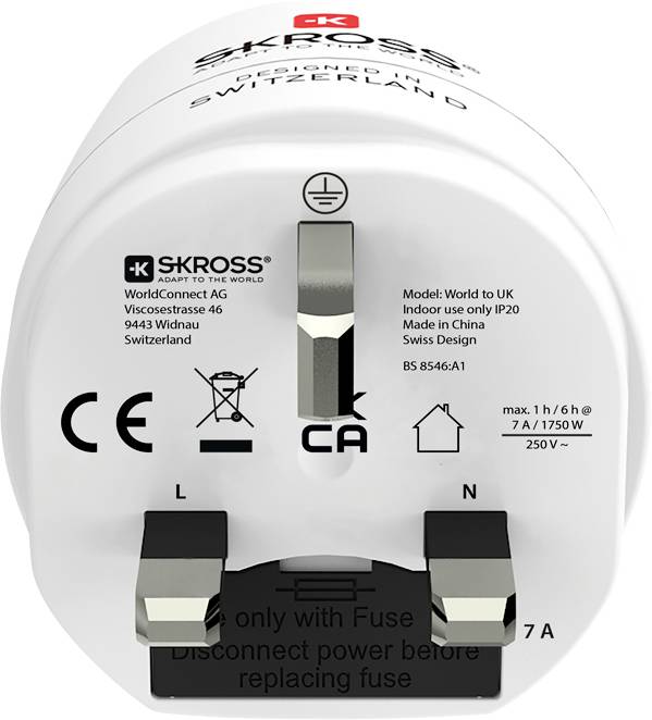 White SKROSS travel adapter with three metal prongs, designed in Switzerland. Text on adapter specifies indoor use only, 7A, 1750W.