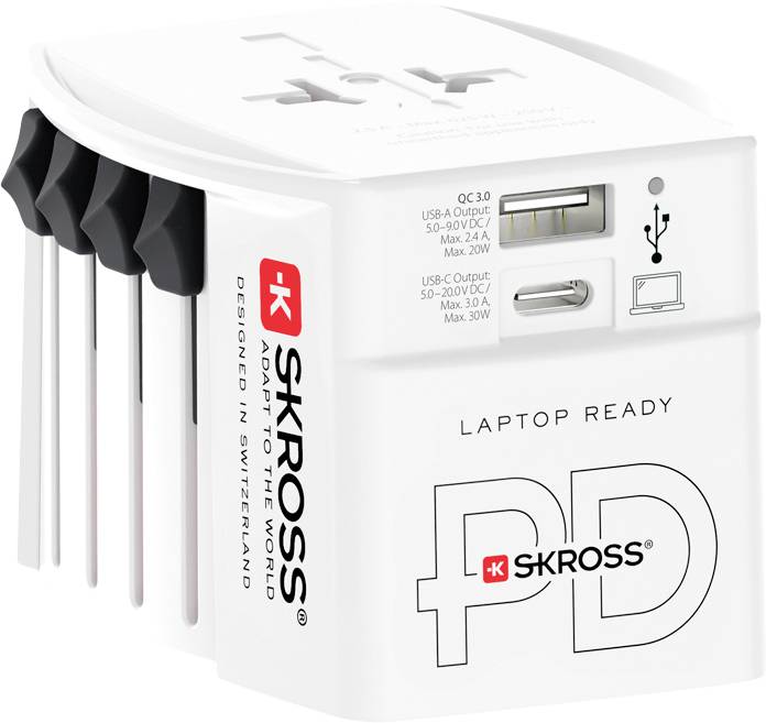 'SKROSS' universal travel adapter with multiple plug types, USB ports, and 'Laptop Ready' label. Model has Swiss design elements.