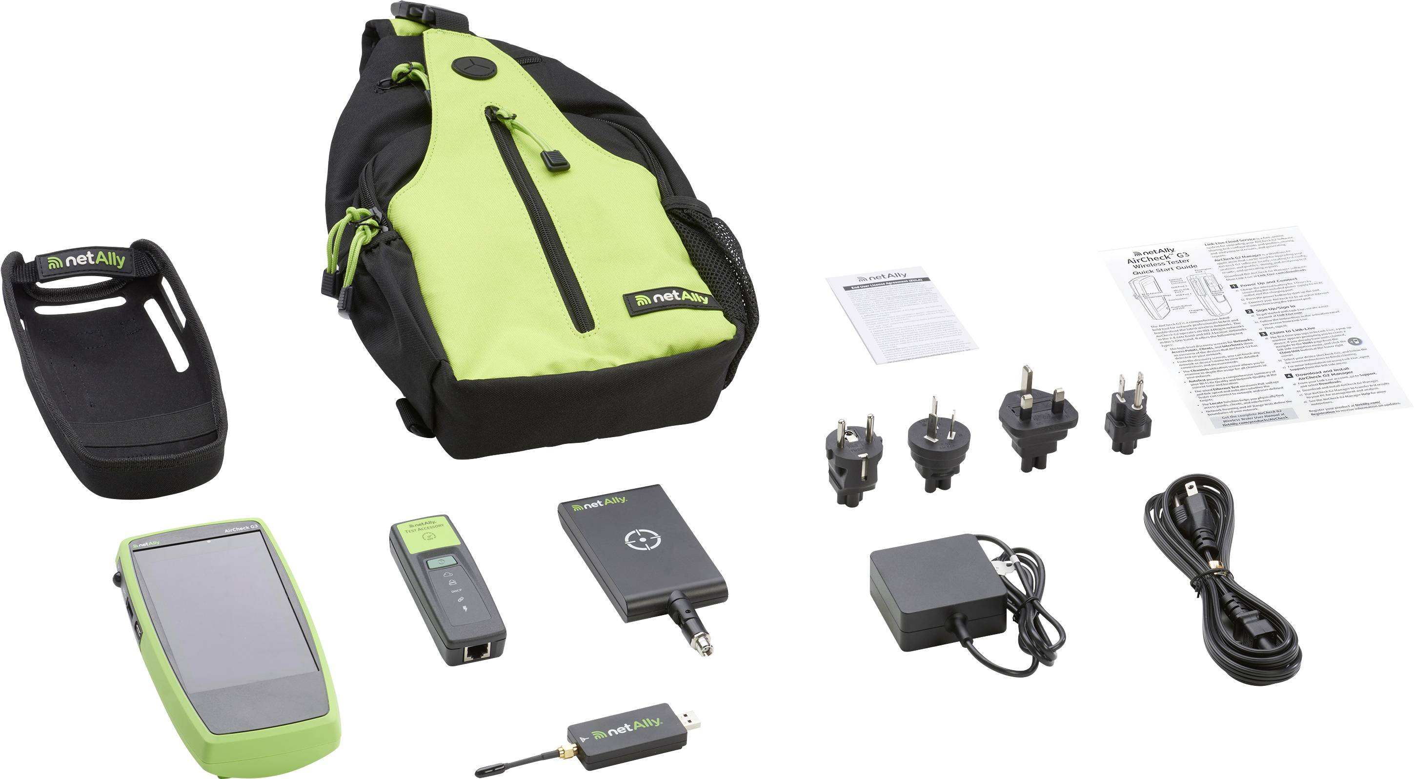 A diagnostic equipment kit including a device with screen, charger, multiple plugs, cables, instruction manuals, and a green carrying bag.