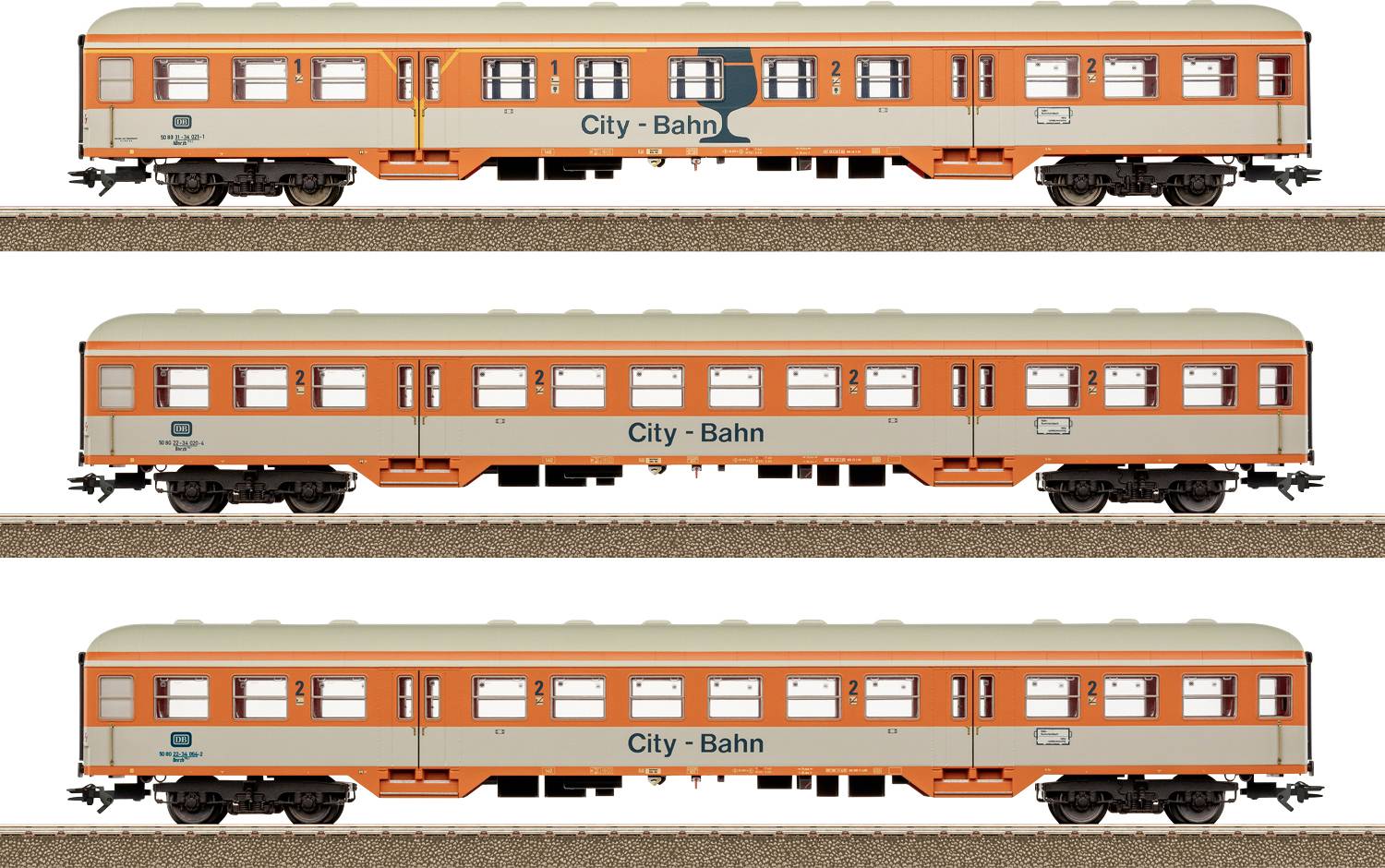 'City-Bahn' train, orange and beige, shown in three views on tracks. Model train design with windows and doors depicted.