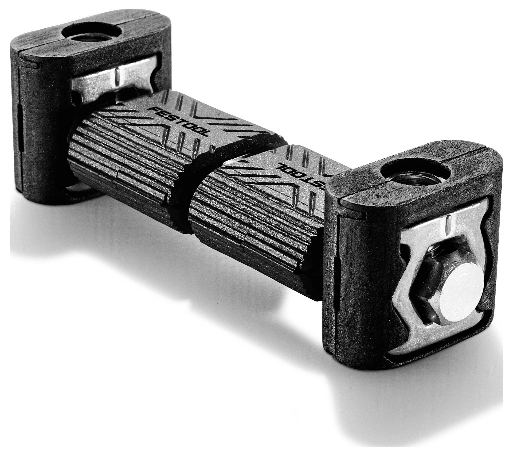 A close-up of a black Festool DOMINO connector, featuring interlocking parts and a textured surface, used for joining wood pieces securely.