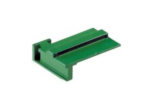 A green plastic connector part with a rectangular shape and a black strip in the middle, likely used in electronic or mechanical assembly.