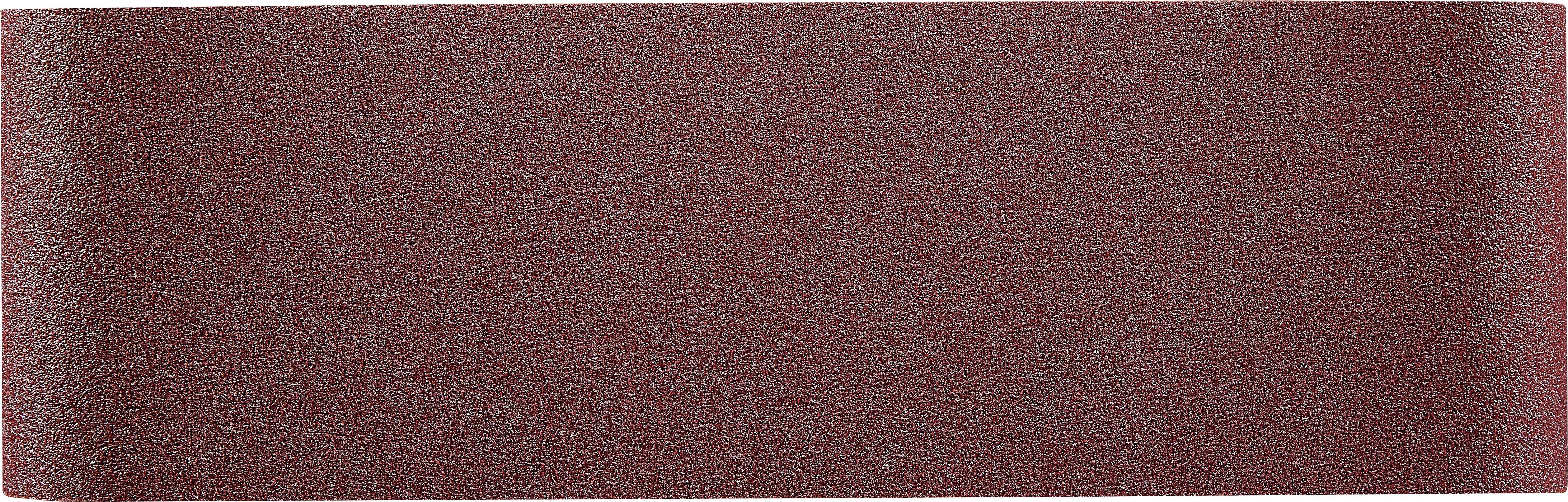 A strip of maroon sandpaper with a textured surface.