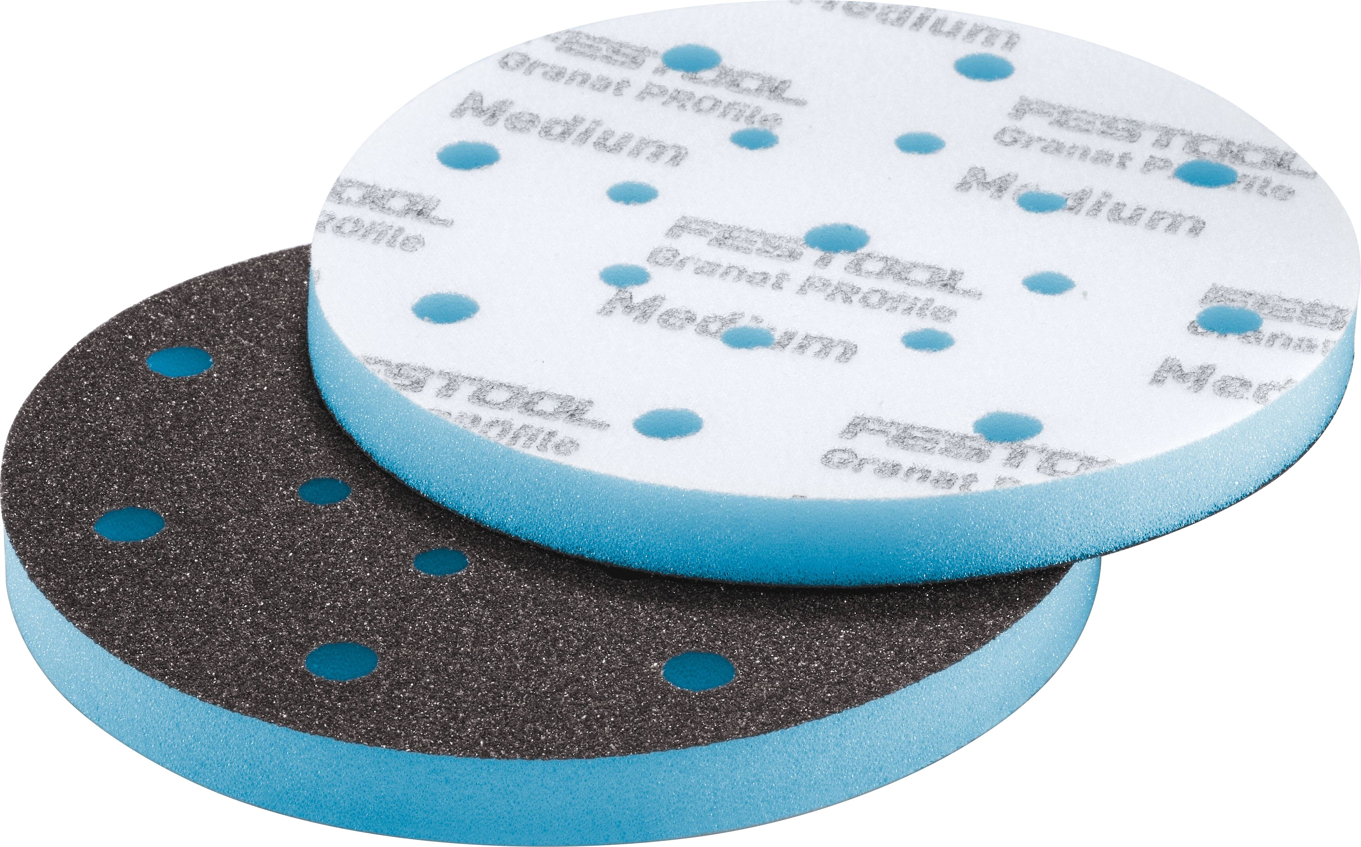 Two round sanding pads, one white and labeled 'Medium', the other black. Both have blue foam edges and multiple holes for dust extraction.