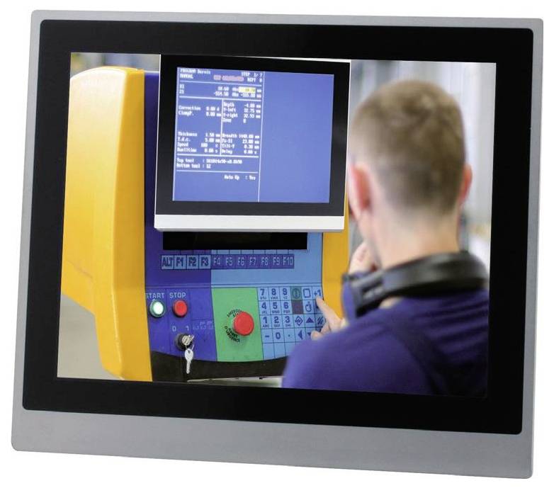 A worker operates a touchscreen machine with a blue interface displaying data, surrounded by brightly colored controls and buttons.