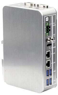Close-up of a silver industrial device with multiple ports including several USB slots and ethernet connections on the side.