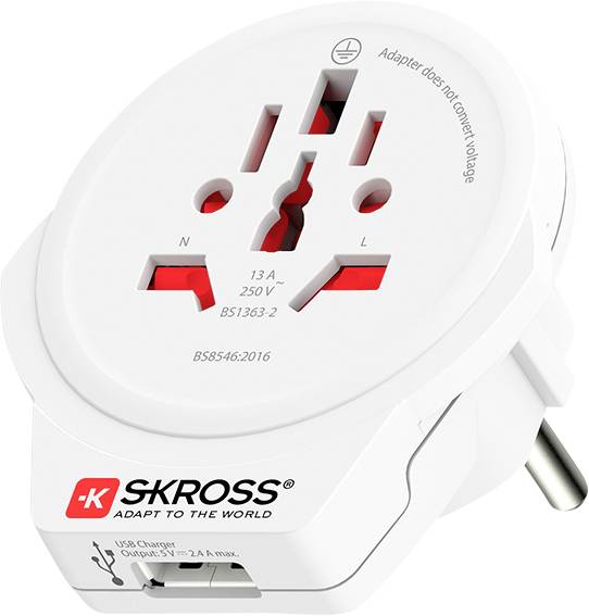 A white travel adapter with multiple plug types for international use, labeled 'SKROSS.' Includes a USB charging port and 250V capacity.