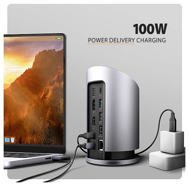 Laptop connected to a hub with multiple ports on the side, labeled '100W Power Delivery Charging'.