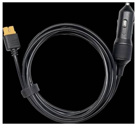 A coiled black car charger cable with an orange connector on one end and a DC plug on the other against a black background.