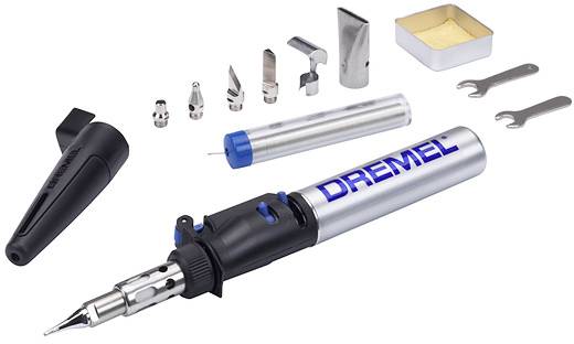 Dremel soldering iron kit with accessories including various nozzles, spanners, and a sponge, arranged on a white background.