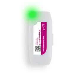 A small white wireless alert device with a green LED indicator glowing on the top left corner and a QR code on the label in the center.