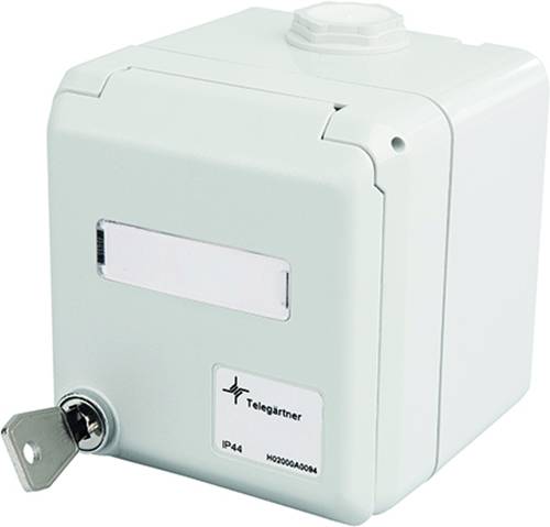 White locked electrical enclosure box with a key lock, cable entry points, and a label reading 'Telegrapher' and 'IP44'.