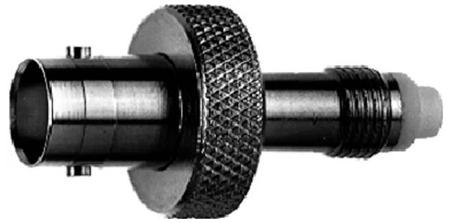 Close-up of a metal threaded connector fitting with a knurled center grip and cylindrical ends, shown on a white background.