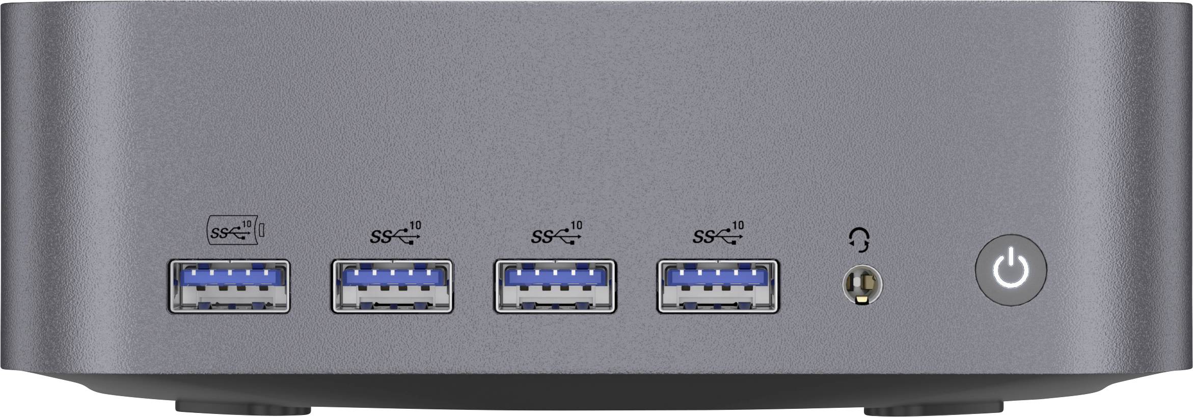 Front panel of a small PC showing four USB-A ports, a headphone jack, and a round power button on the right.