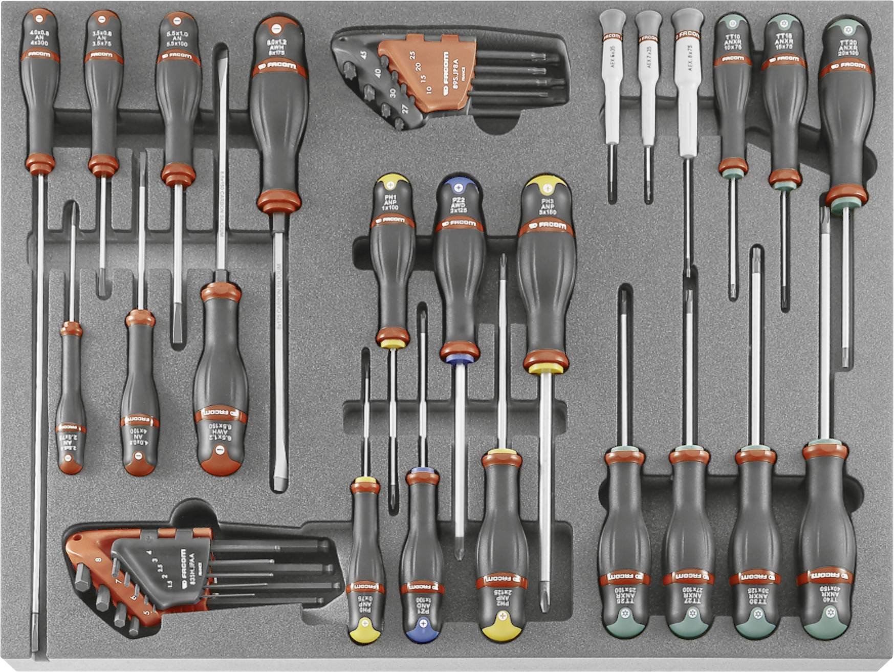 Foam tool tray with assorted screwdrivers, precision drivers, hex keys, and small hand tools neatly organized in compartments.