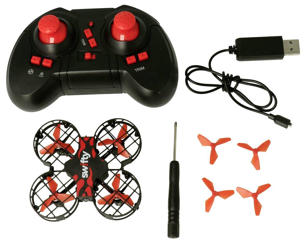 Mini drone kit with controller, USB charger, screwdriver, and four spare propellers.