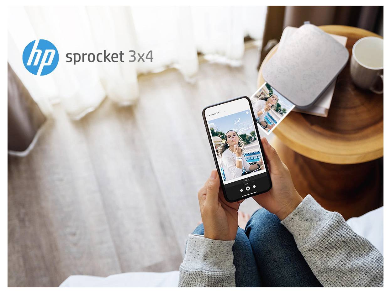 Person using the HP Sprocket 3x4 app to print a photo from a smartphone into a small printer on a table.