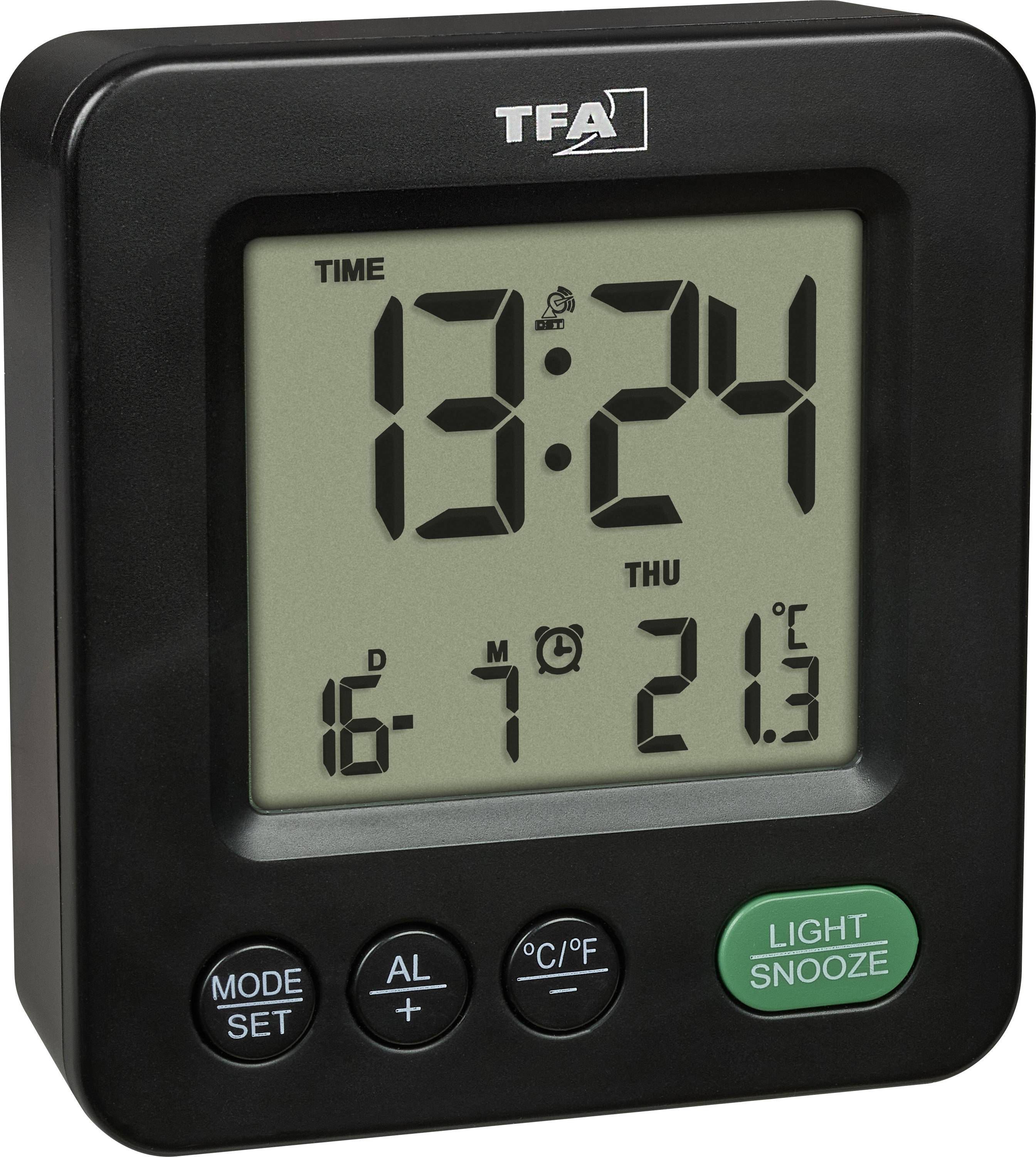 Black TFA digital alarm clock showing 13:24, Thursday, date 16-7, and temperature 21.3°C, with mode, alarm, °C/°F, and light/snooze buttons.