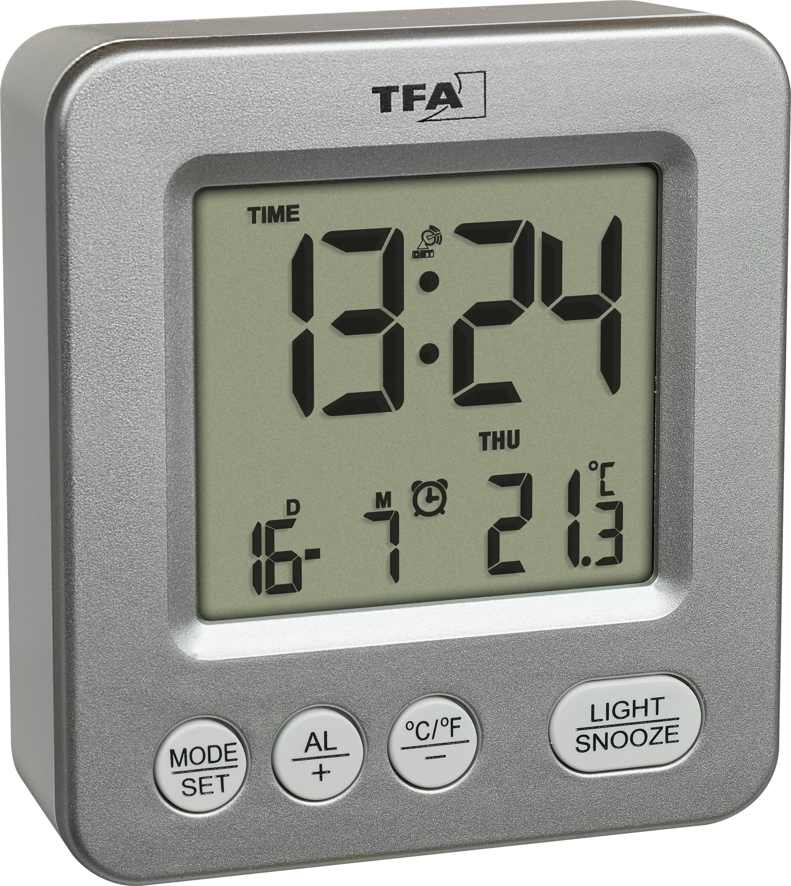 Silver digital alarm clock showing 13:24, Thursday, date 16-7, and temperature 21.3°C, with mode, alarm, and light/snooze buttons.