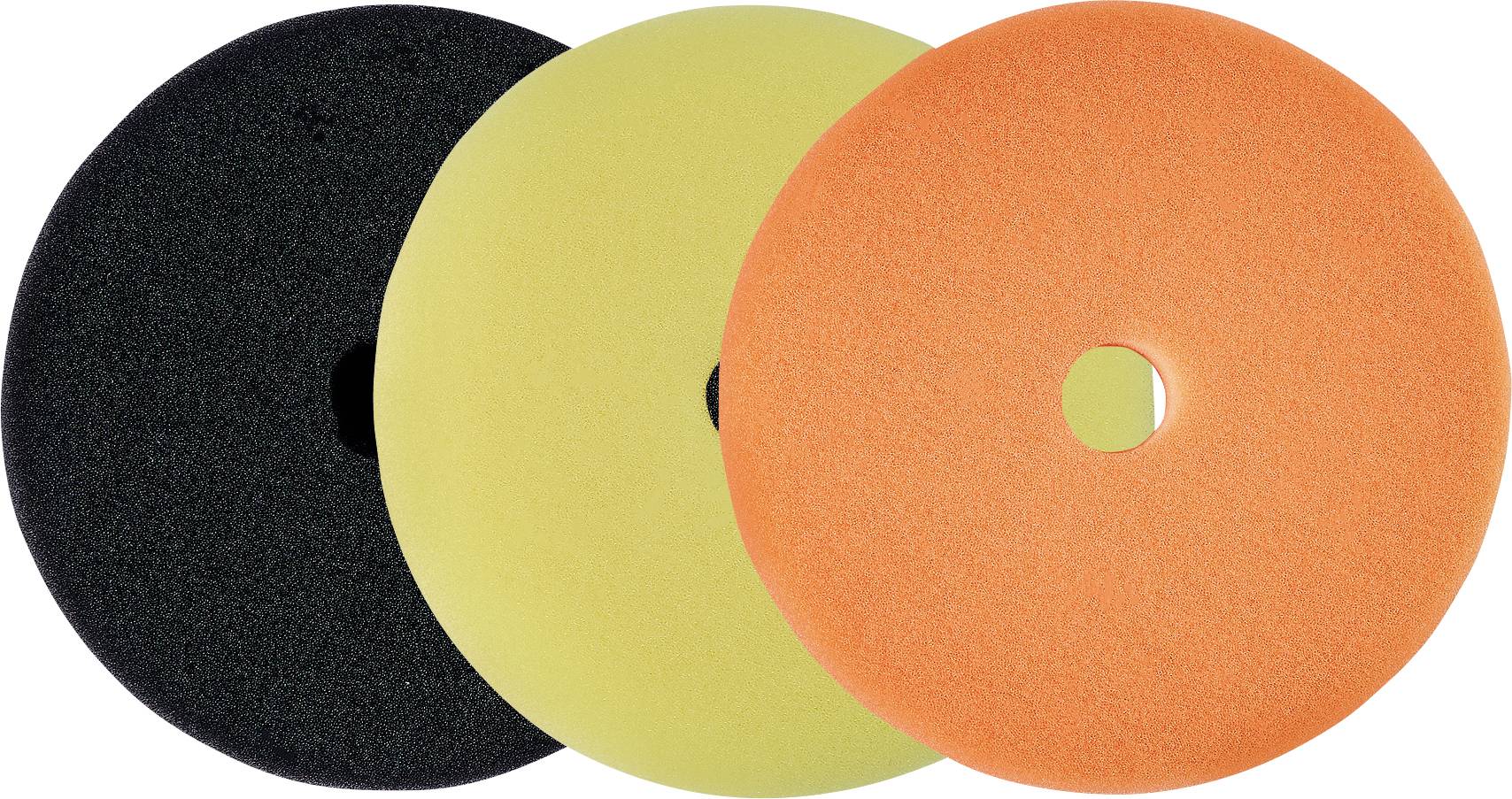 Three overlapping circular abrasive pads in black, yellow, and orange, each with a center hole, on a white background.