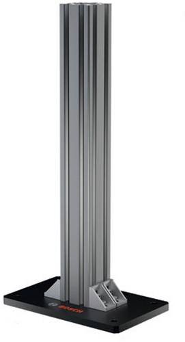 A tall silver metal column mounted on a black base, shown as a structural support or display stand.