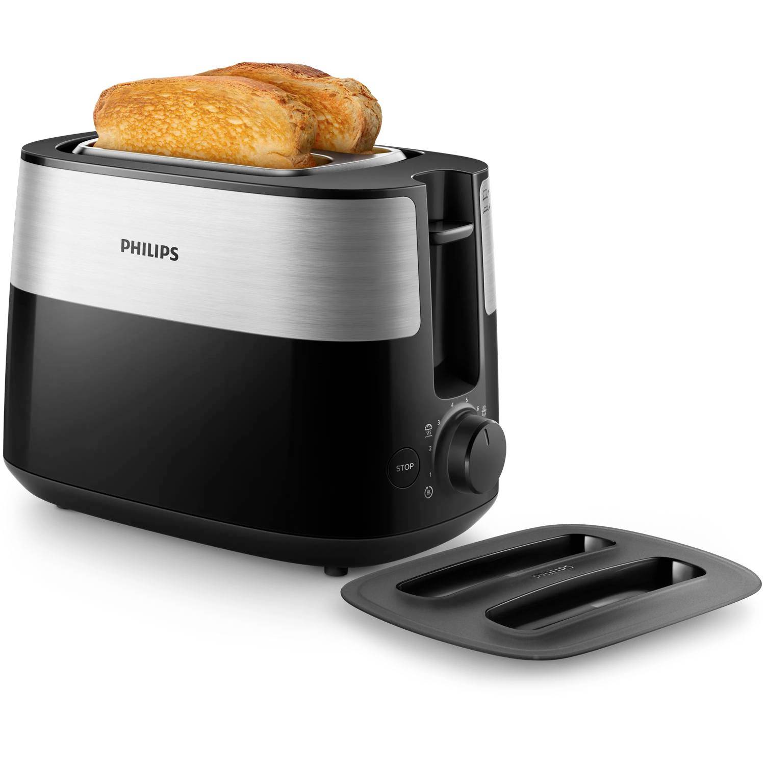 Philips two-slice toaster with toasted bread and a removable crumb tray on a white background.