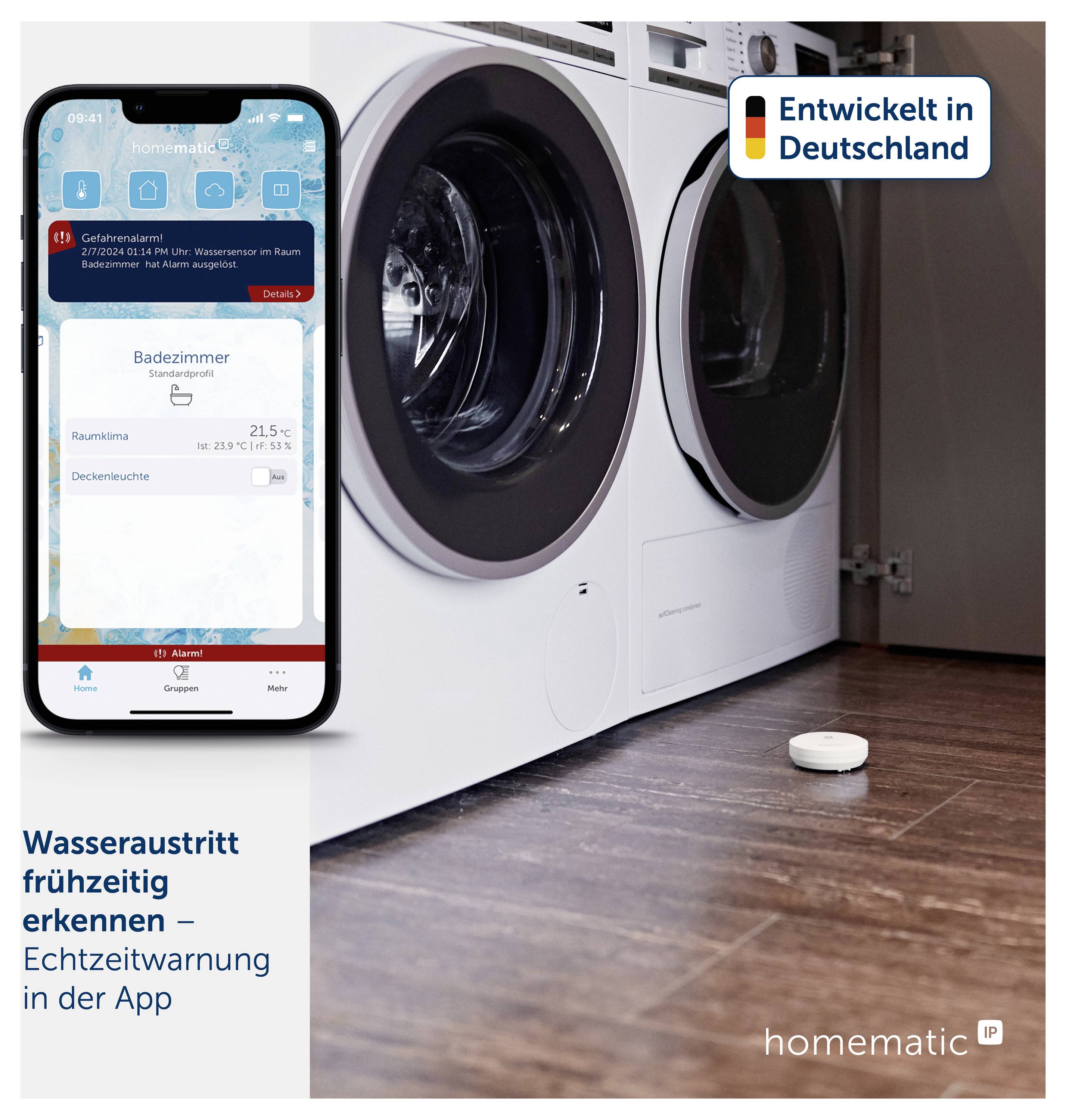 Smartphone app warns early of water leakage in the bathroom; on the right stand a washing machine and tumble dryer, with a small sensor lying on the floor.
