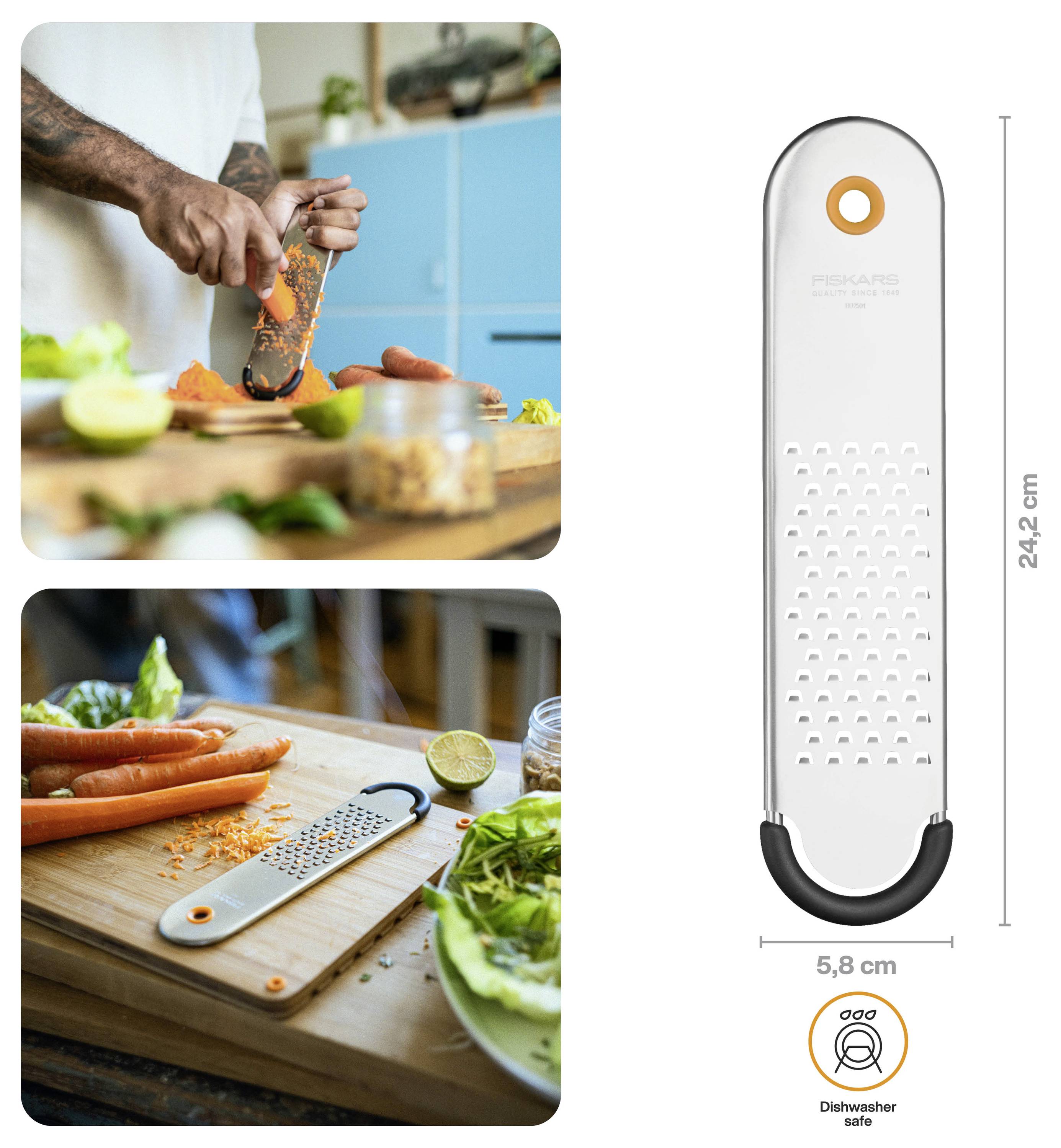 Stainless steel handheld grater with orange handle accents, shown alongside photos of grating carrots and slicing vegetables; product dimensions 24.2 cm by 5.8 cm and dishwasher safe.