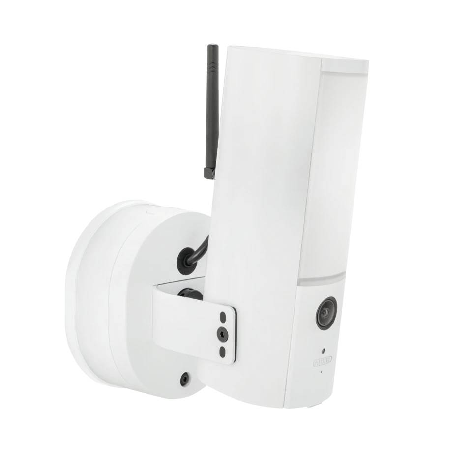 White wall-mounted security camera with antenna, shown in profile against a plain background.