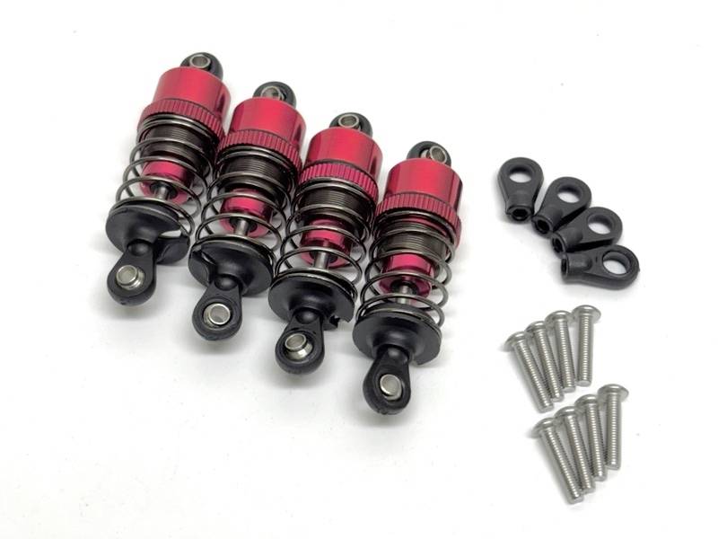 Four red-and-black coilover shocks with mounting eyes, plus black brackets and silver screws laid out on a white background.
