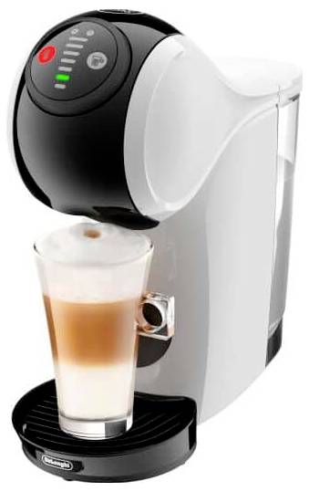 Compact coffee machine dispensing layered coffee into a clear glass on a black drip tray.