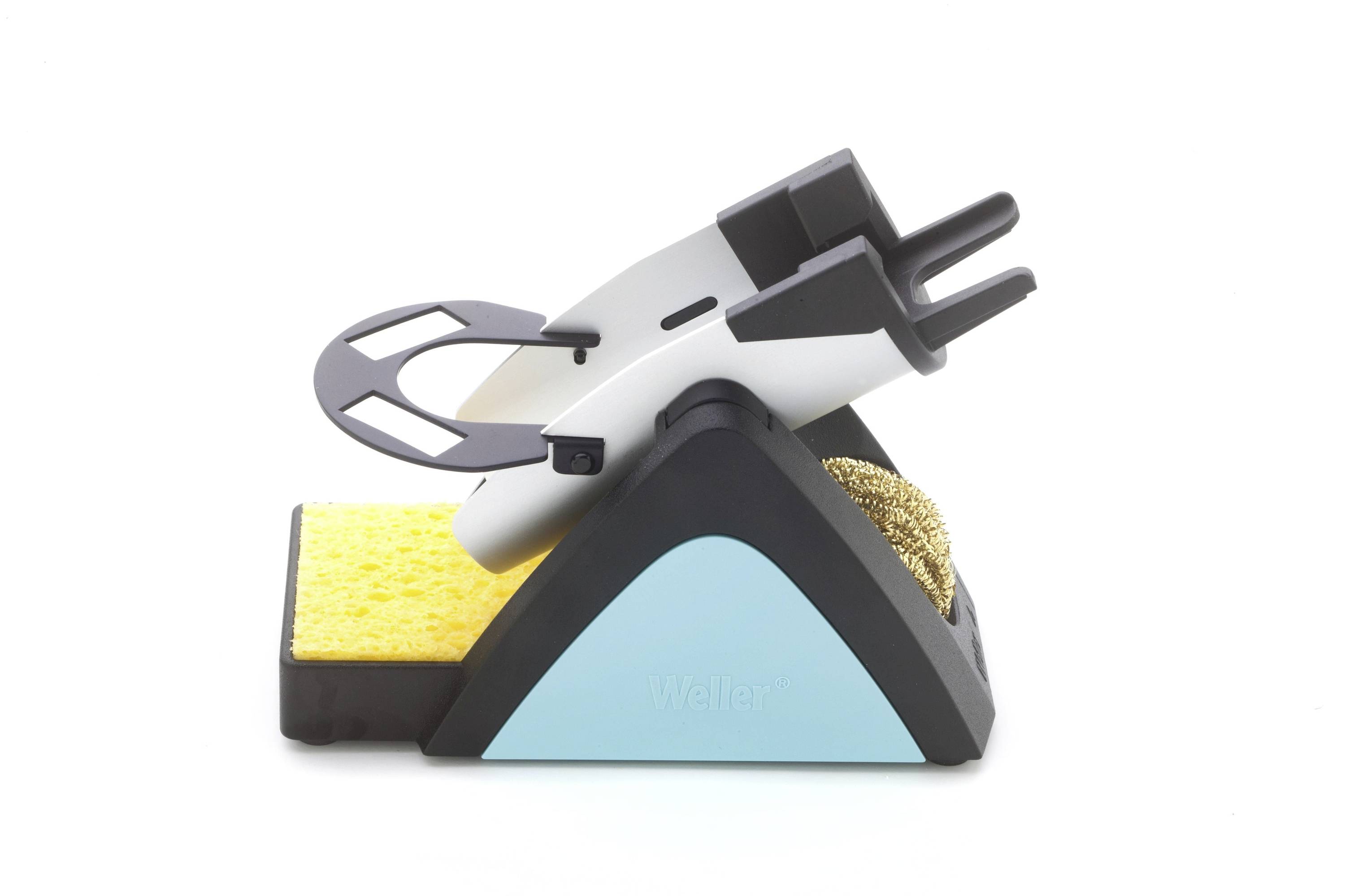 Electric soldering iron resting in a compact triangular stand with sponge and brass wool for cleaning the tip.
