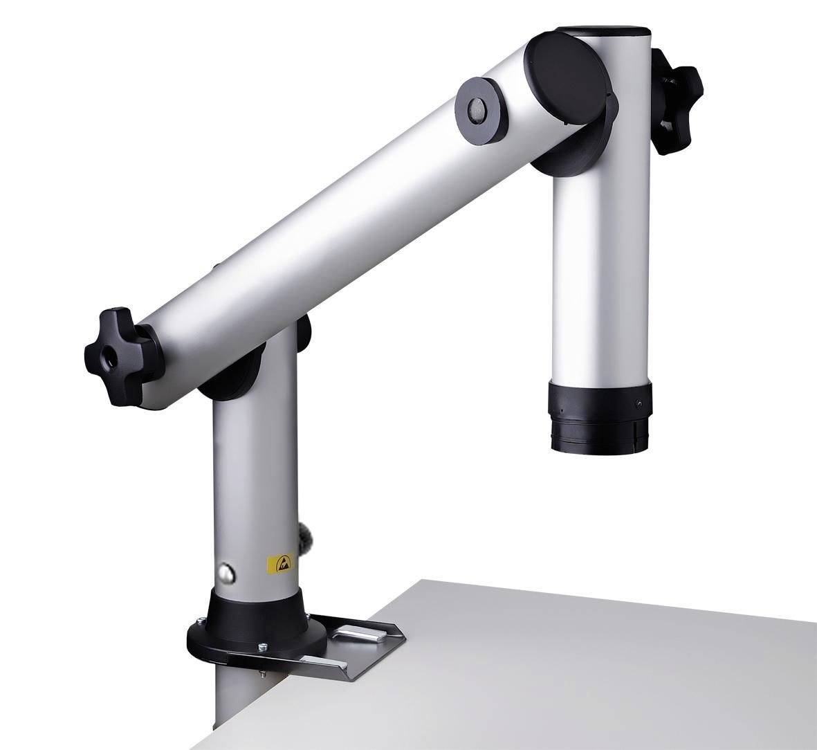 Adjustable silver monitor arm mounted to a desk, with two pivoting joints and a vertical support post.