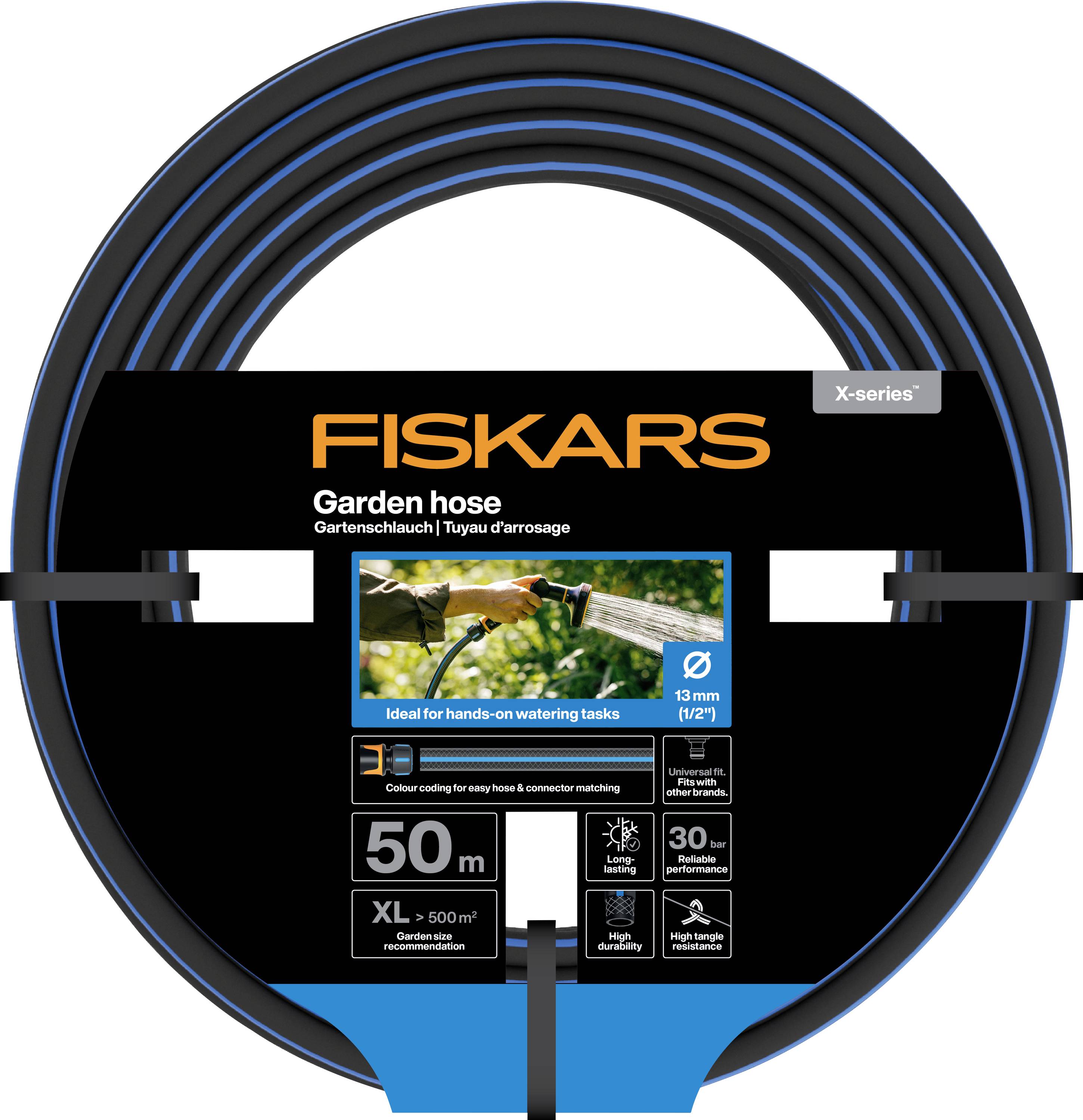 Coiled FISKARS X-series garden hose package, labeled 50 m, XL, 13 mm, with photo of hand watering plants and features icons.