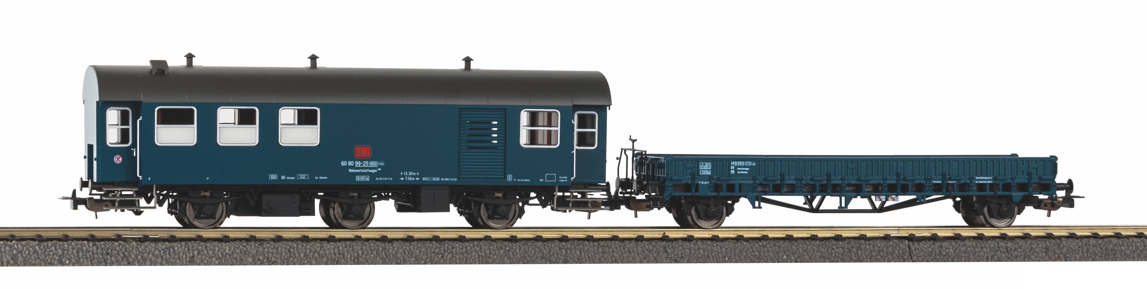 Model railway flatbed and passenger coach on track, shown side by side on a white background.