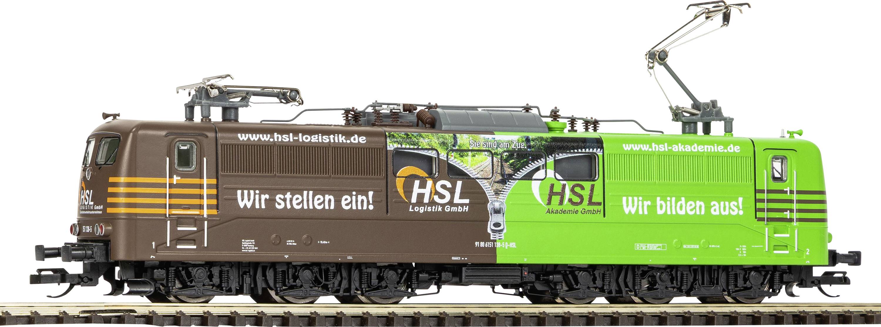 Side view of a HSL Logistics train locomotive in brown and green advertising livery, with the text 'Wir stellen ein!' and 'Wir bilden aus!' on the sides.