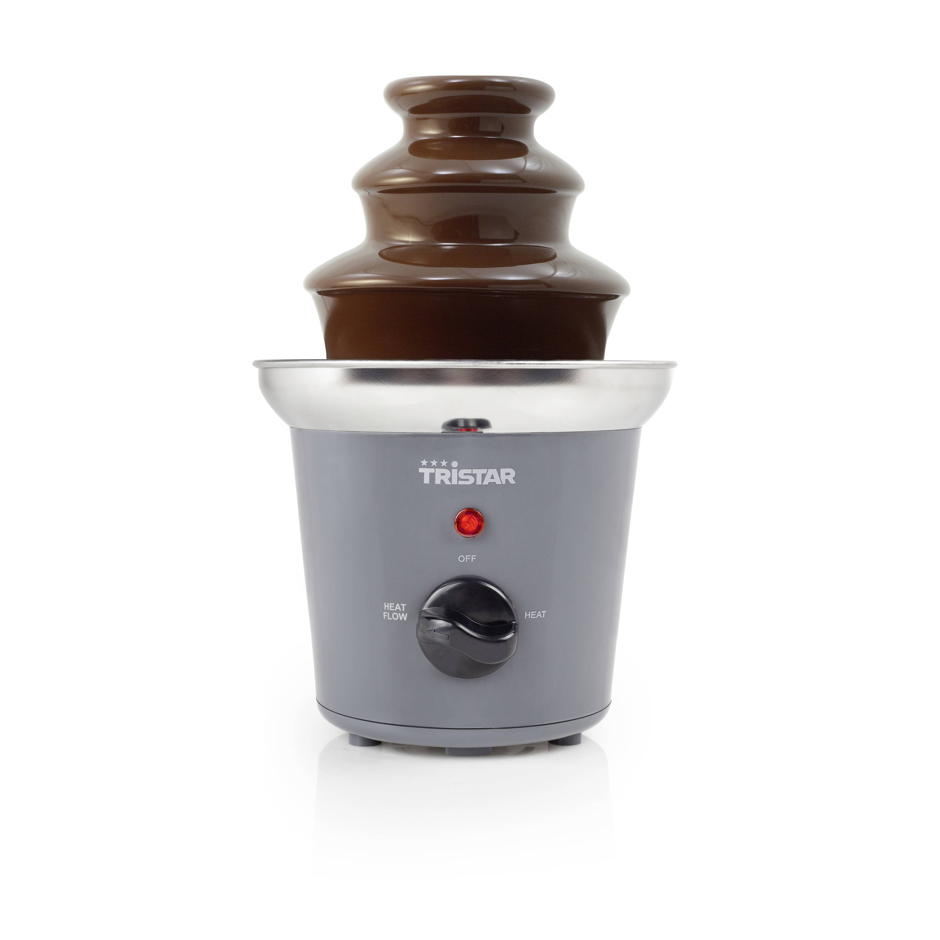Chocolate fountain machine with a brown chocolate cascade and stainless steel bowl on a gray Tristar base with power light and control dial.