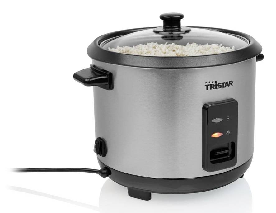 Tristar electric rice cooker with glass lid, full of cooked rice, showing indicator lights and power cord.