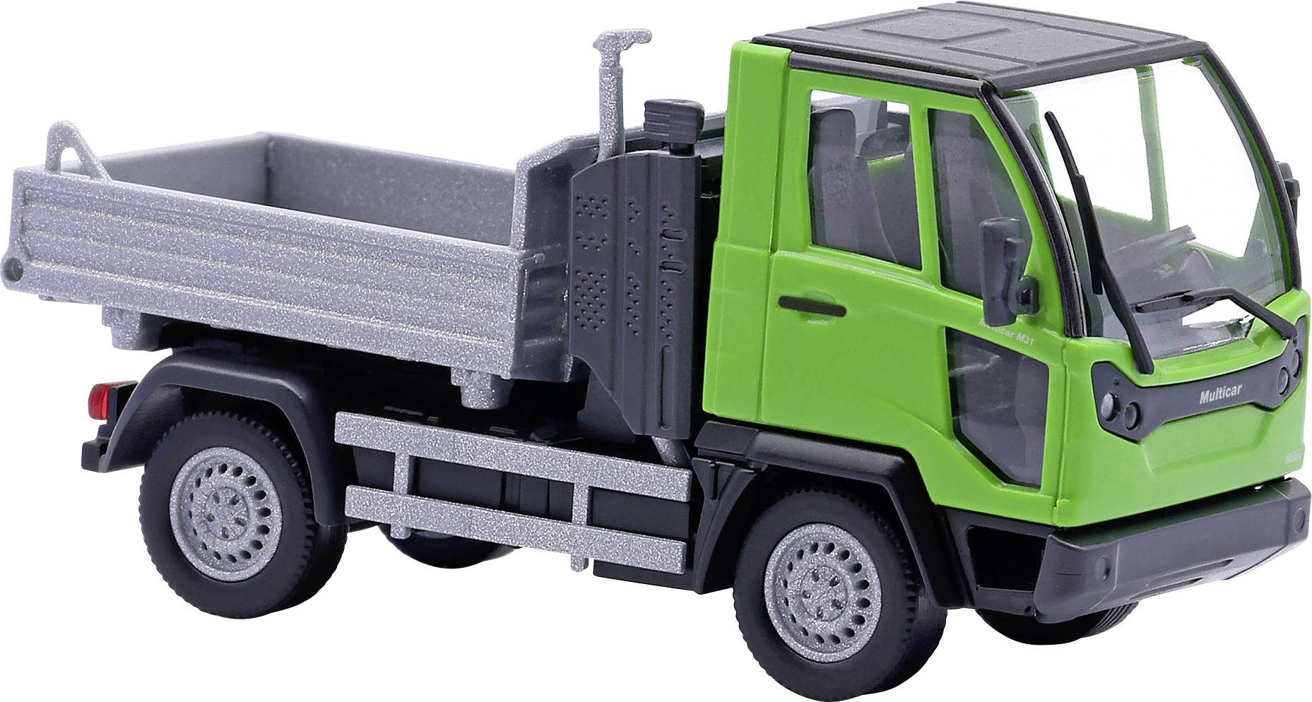 Green toy dump truck with gray bed, shown in side view on a white background.