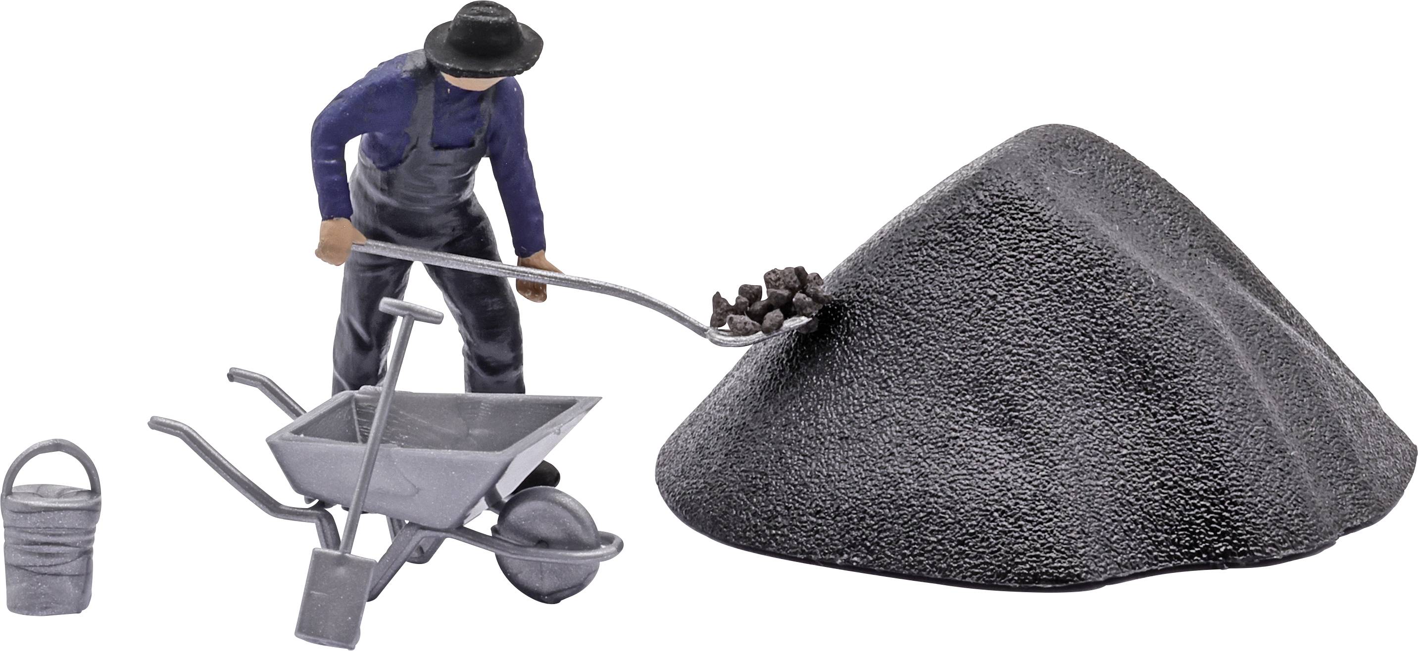 Miniature miner pushes a wheelbarrow beside a large mound of coal, with a bucket and shovel nearby.
