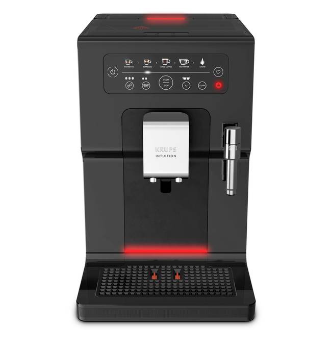 Black KRUPS automatic espresso machine with illuminated controls, central coffee spout, side steam wand, and drip tray