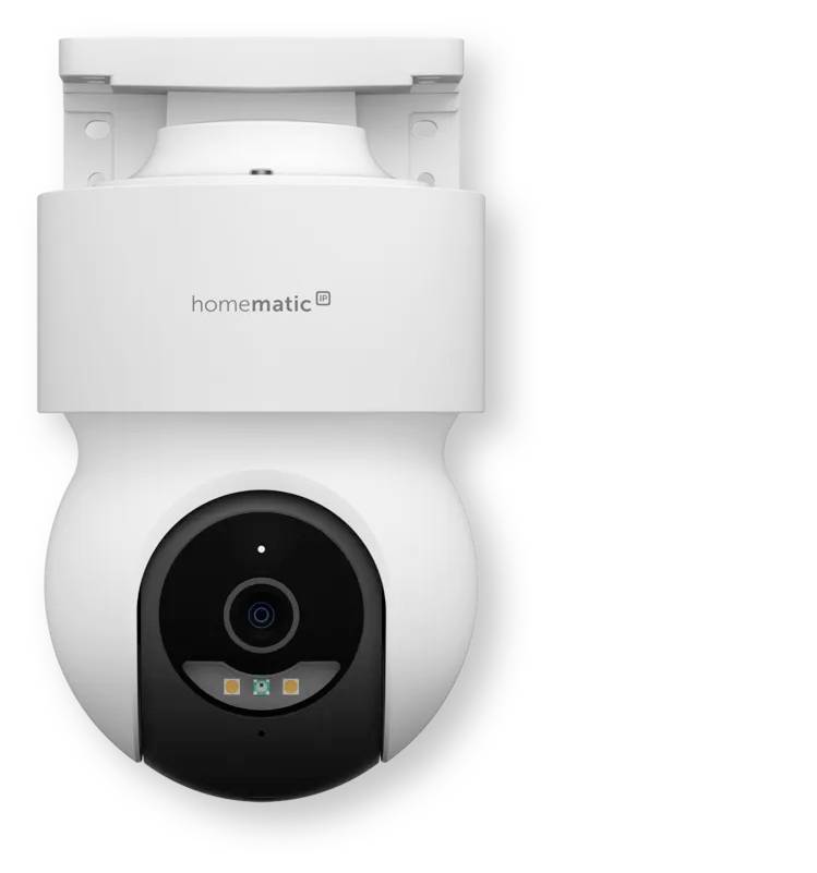 Wall-mounted white Hommatic security camera with a black lens module and indicator lights on the front.