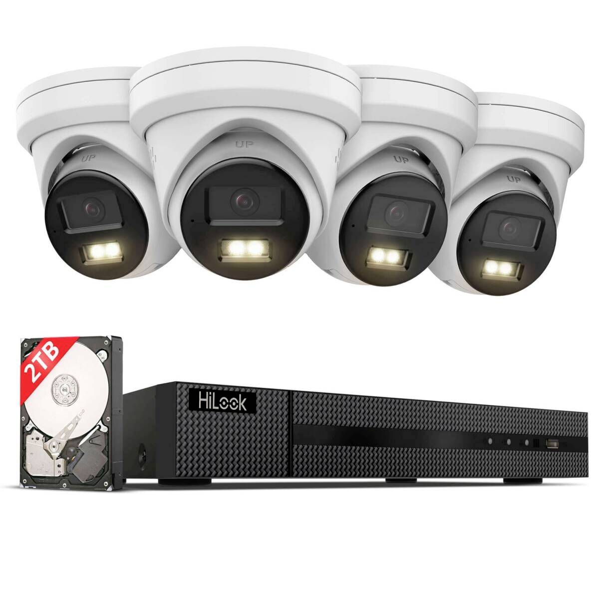 Four white security cameras above a HiLook DVR recorder and 2TB hard drive, showing a complete CCTV surveillance system.