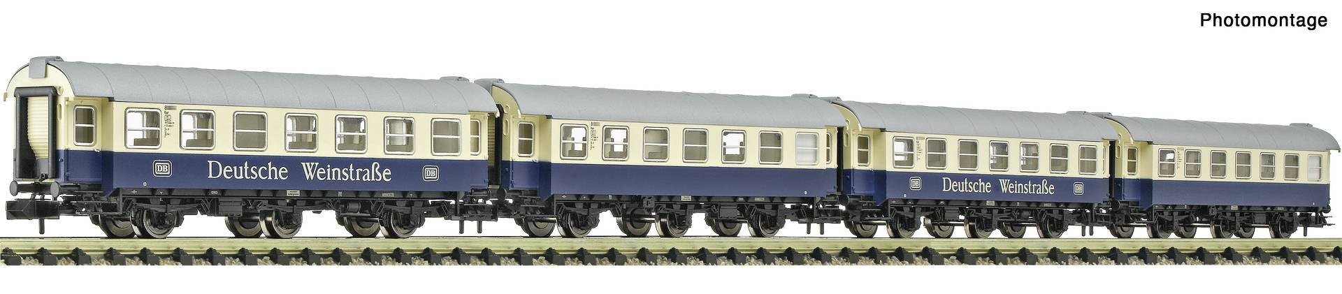 Model train passenger carriages labeled Deutsche Weinstrasse on a track, with “Photomontage” in the top right.