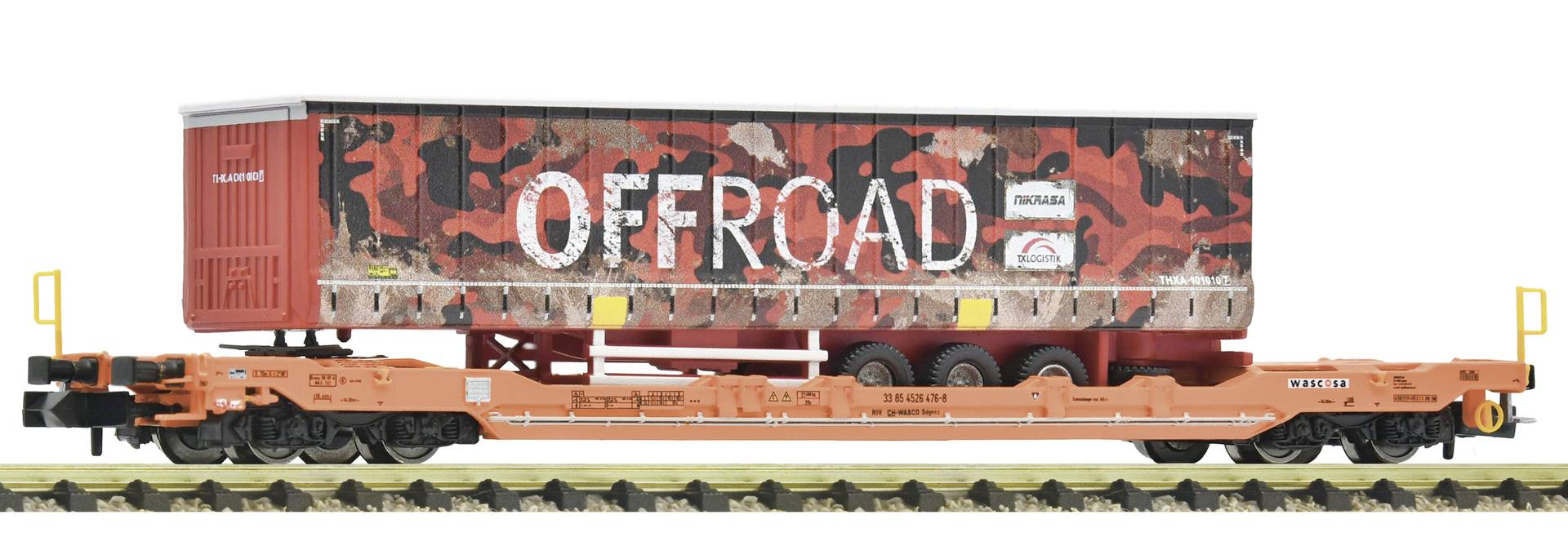 Flatbed railcar carrying a red camouflage shipping container labeled 'OFFROAD' on a white background.