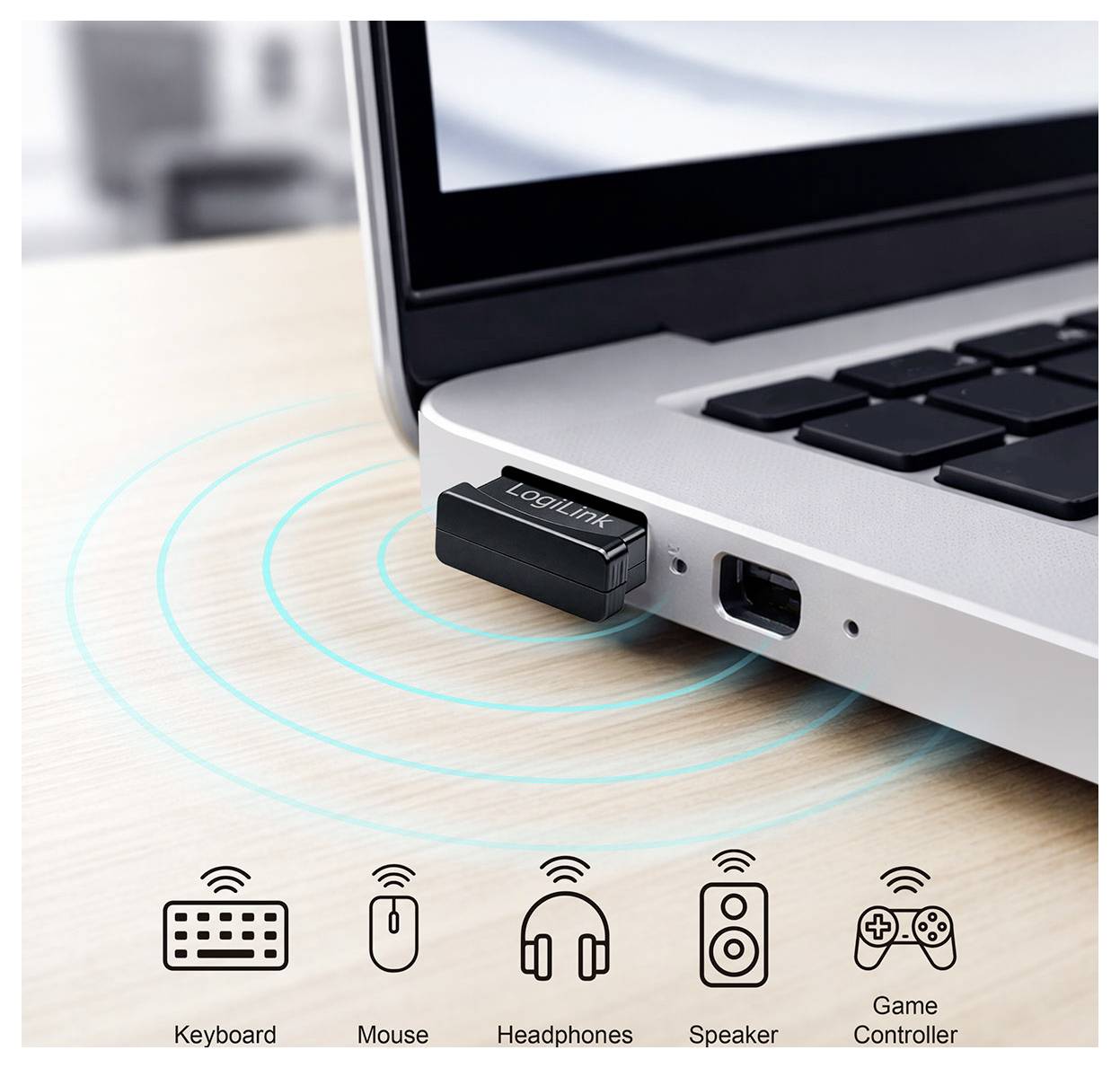 USB wireless adapter plugged into a laptop, with signal rings and icons showing it connects keyboard, mouse, headphones, speaker, and game controller.