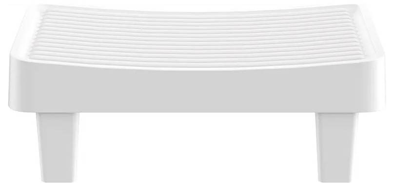White low-profile bed footboard or bench with slatted top and four short legs on a white background