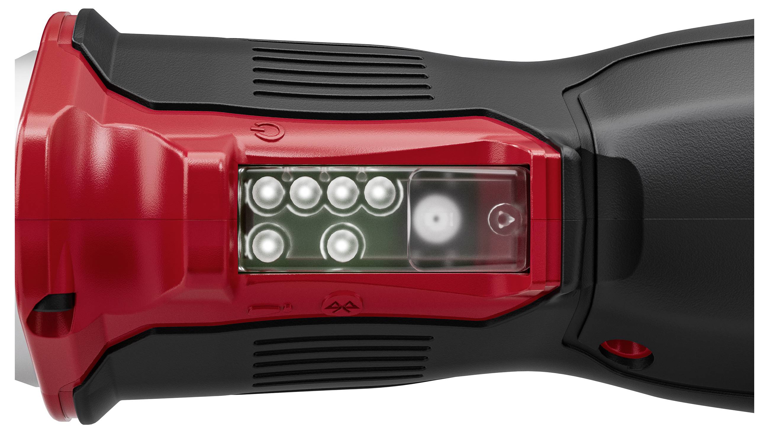 Close-up of a black-and-red handheld flashlight or work light with a clear front lens showing multiple LEDs on a white background.