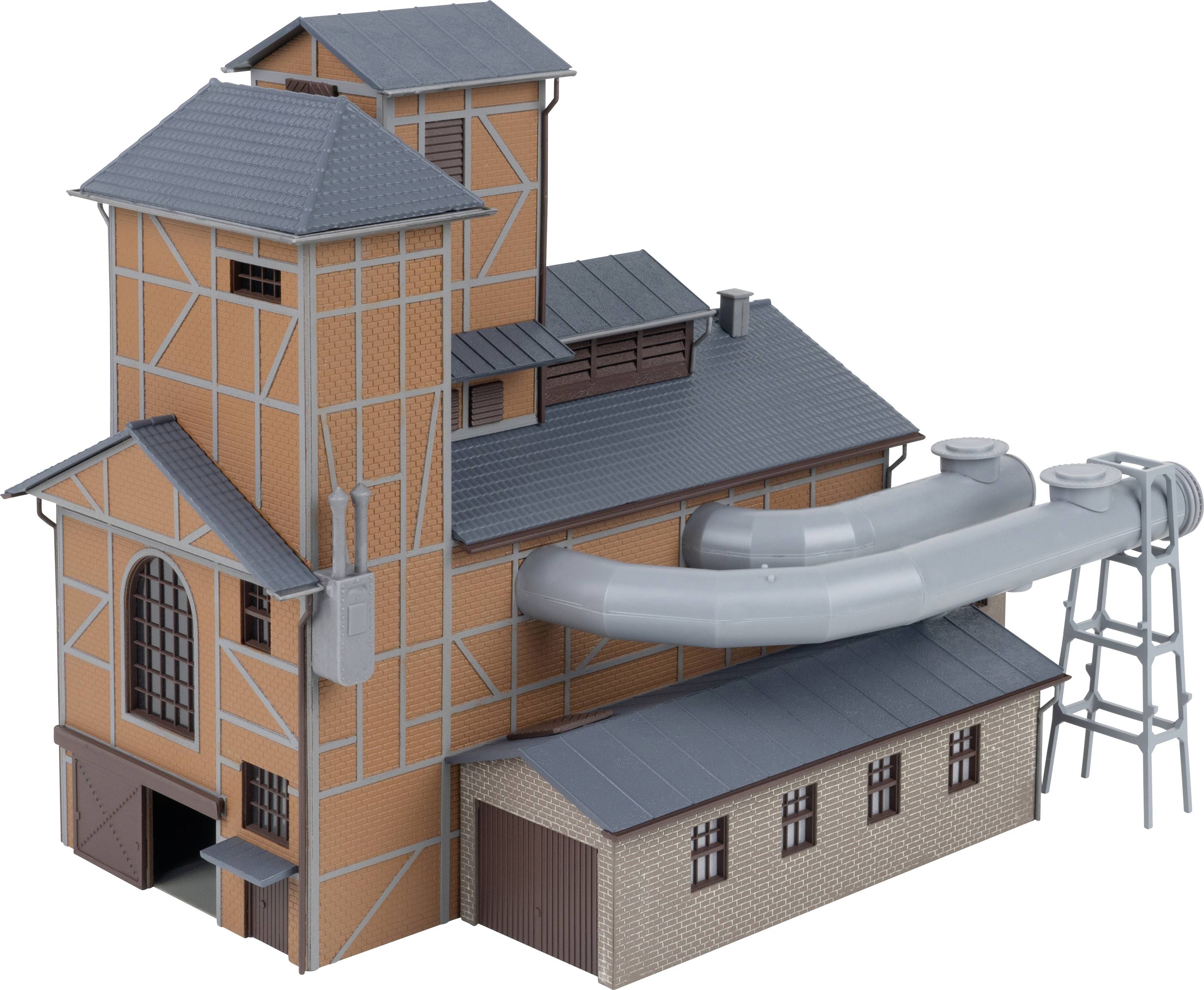 3D industrial building with tall brick tower, large gray pipes and silo-like equipment attached on the right, shown on a white background.