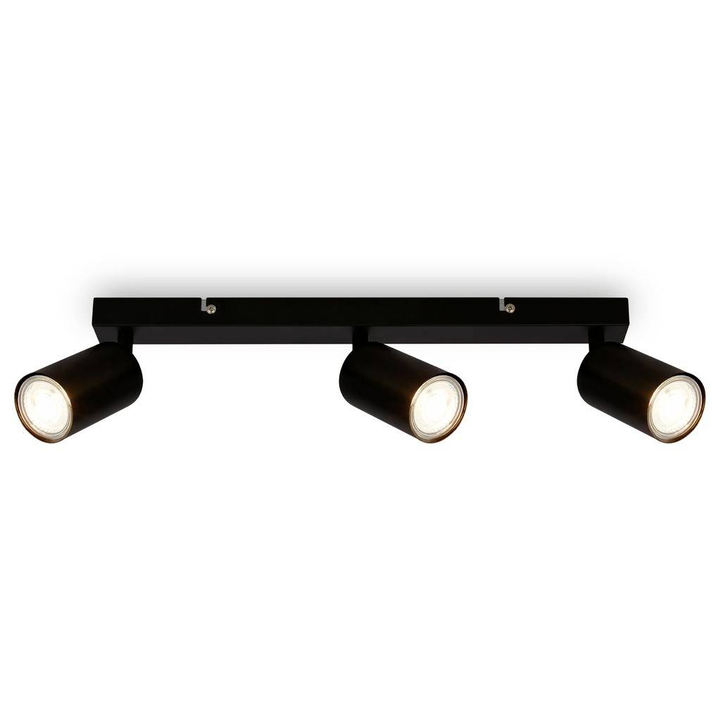 Black three-light adjustable track spotlight fixture with cylindrical lamps on a bar.